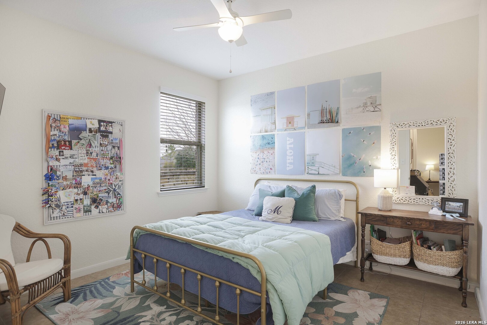 3806 Brahman Road Bulverde, TX 78163 - Photo 25 of 36 a bedroom with a bed and a table with chair