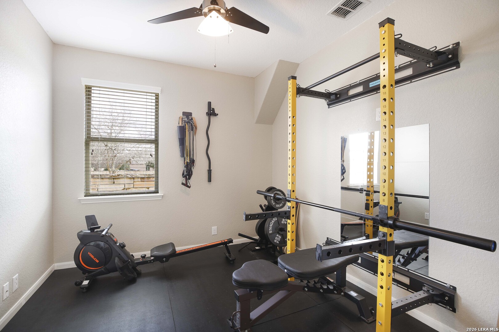 3806 Brahman Road Bulverde, TX 78163 - Photo 26 of 36 a view of a room with gym equipment