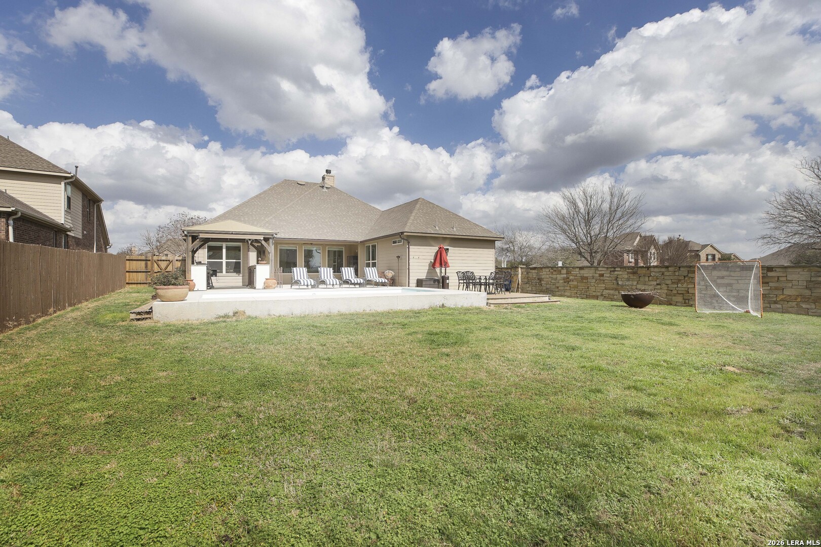 3806 Brahman Road Bulverde, TX 78163 - Photo 34 of 36 a front view of a house with garden