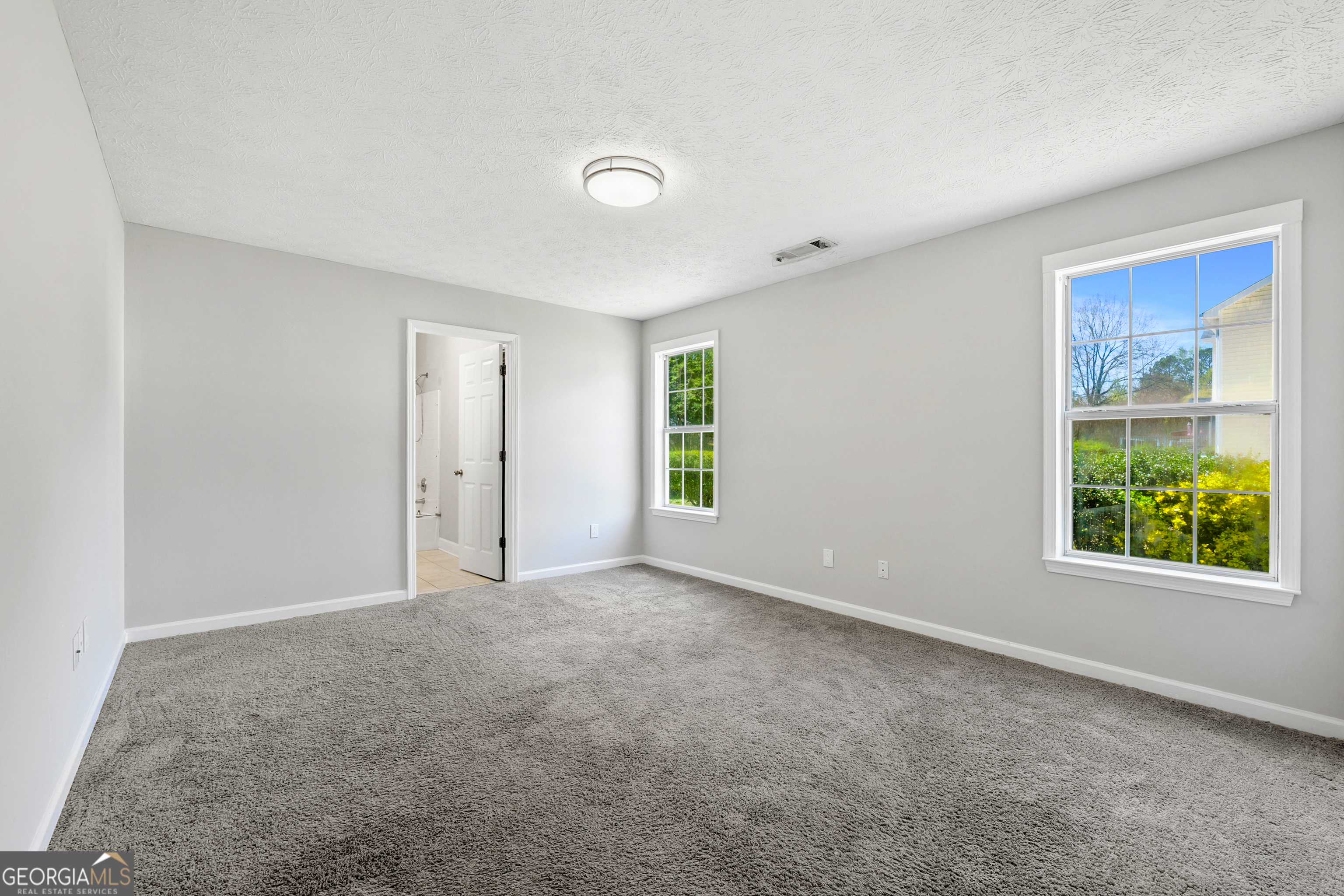 108 Nicki Court Hampton, GA 30228 - Photo 12 of 27 a view of an empty room with a window