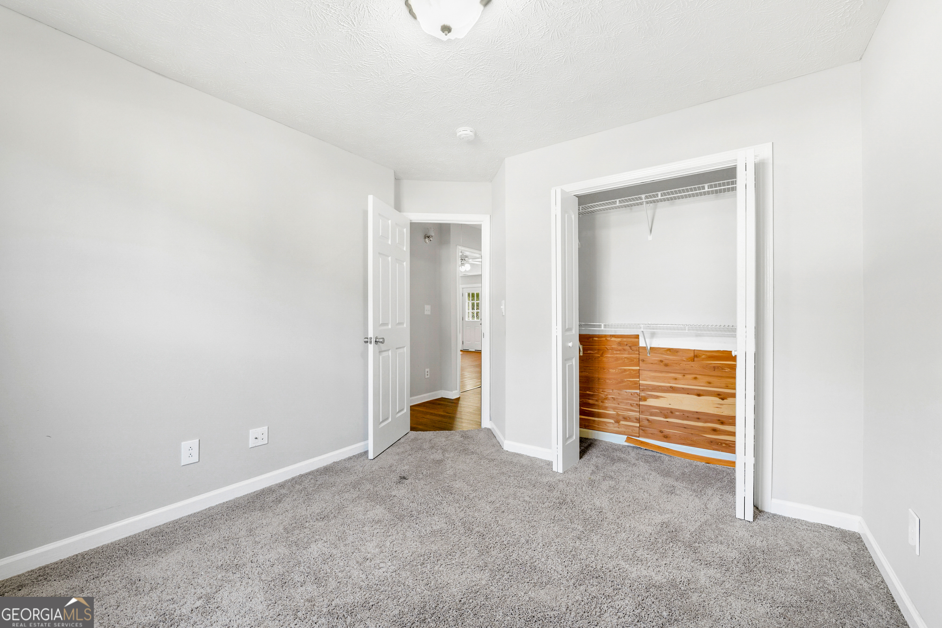 108 Nicki Court Hampton, GA 30228 - Photo 20 of 27 an empty room with an entryway