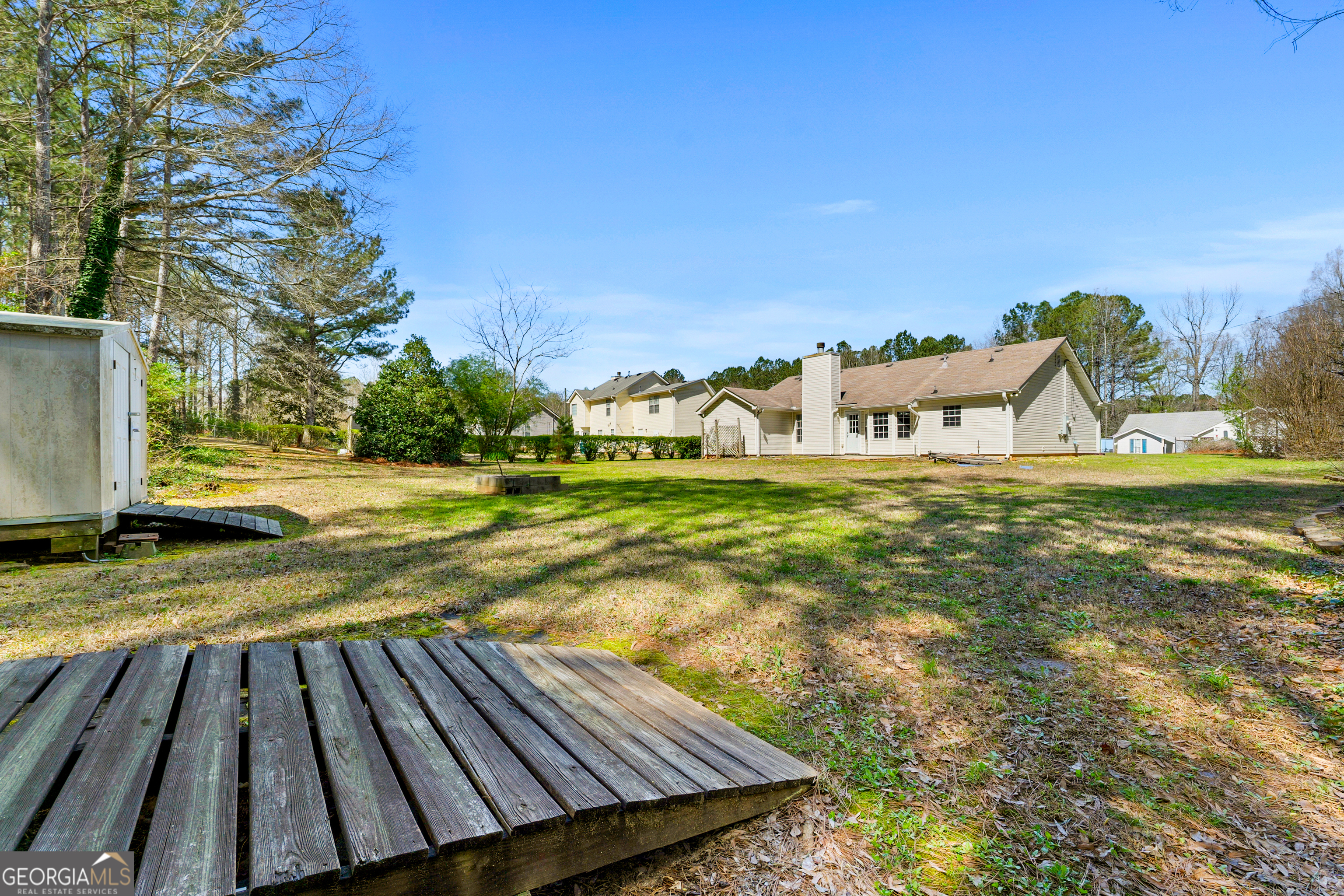 108 Nicki Court Hampton, GA 30228 - Photo 26 of 27 a view of a yard with swimming pool
