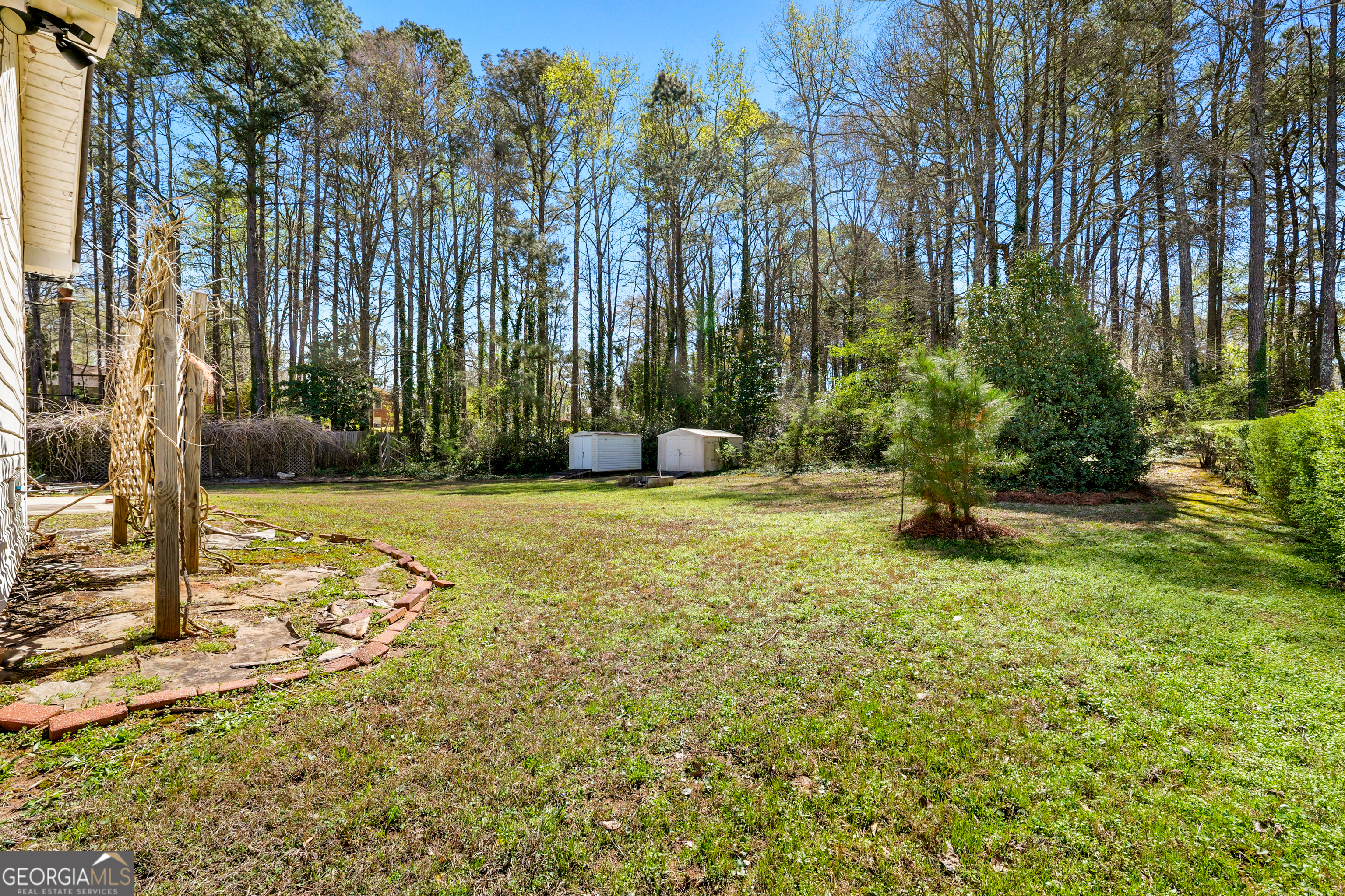 108 Nicki Court Hampton, GA 30228 - Photo 27 of 27 a view of a garden with a tree