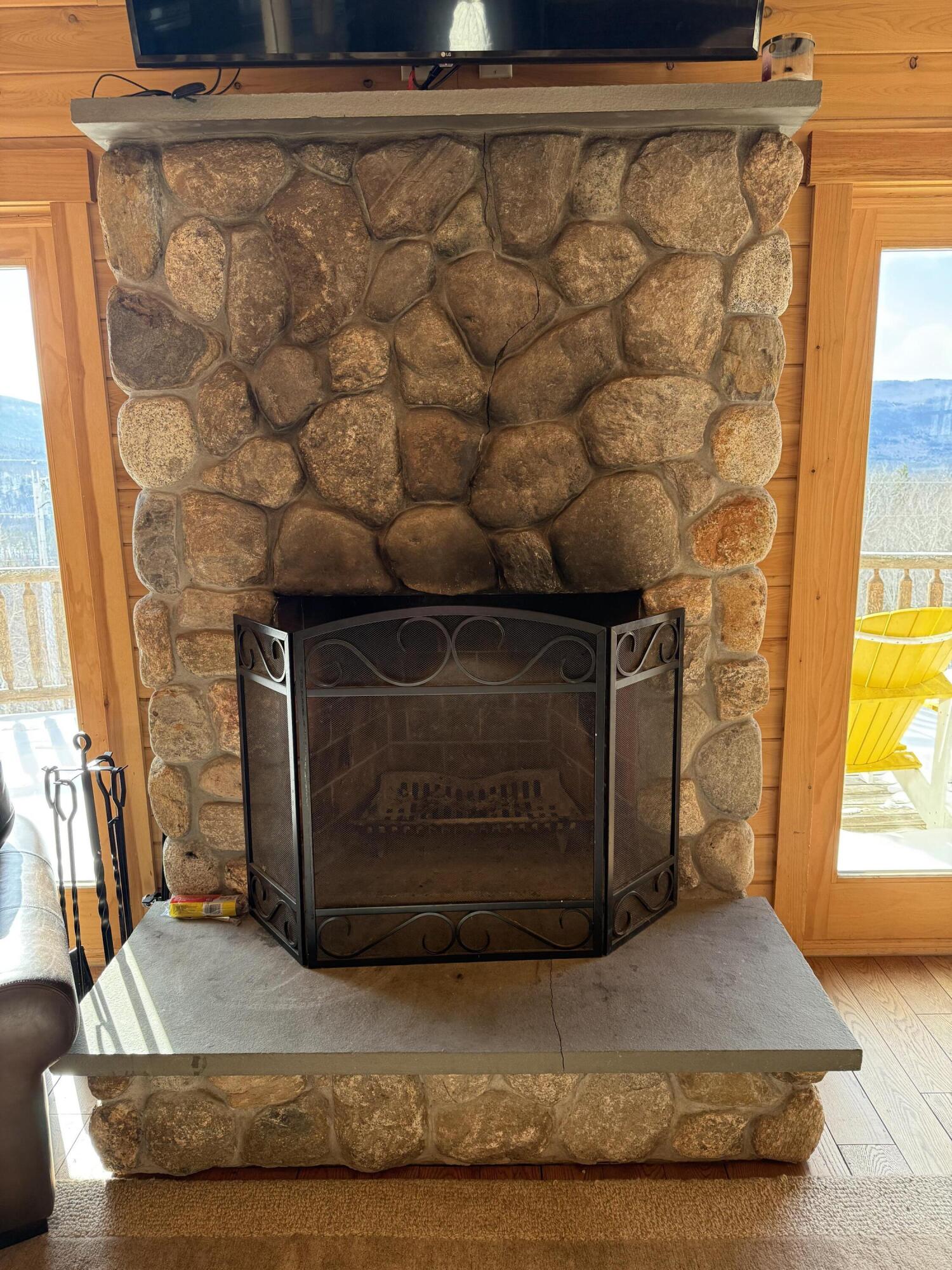 98 Mountain Vista Road Bethel, ME 04217 - Photo 8 of 32 Living room fireplace