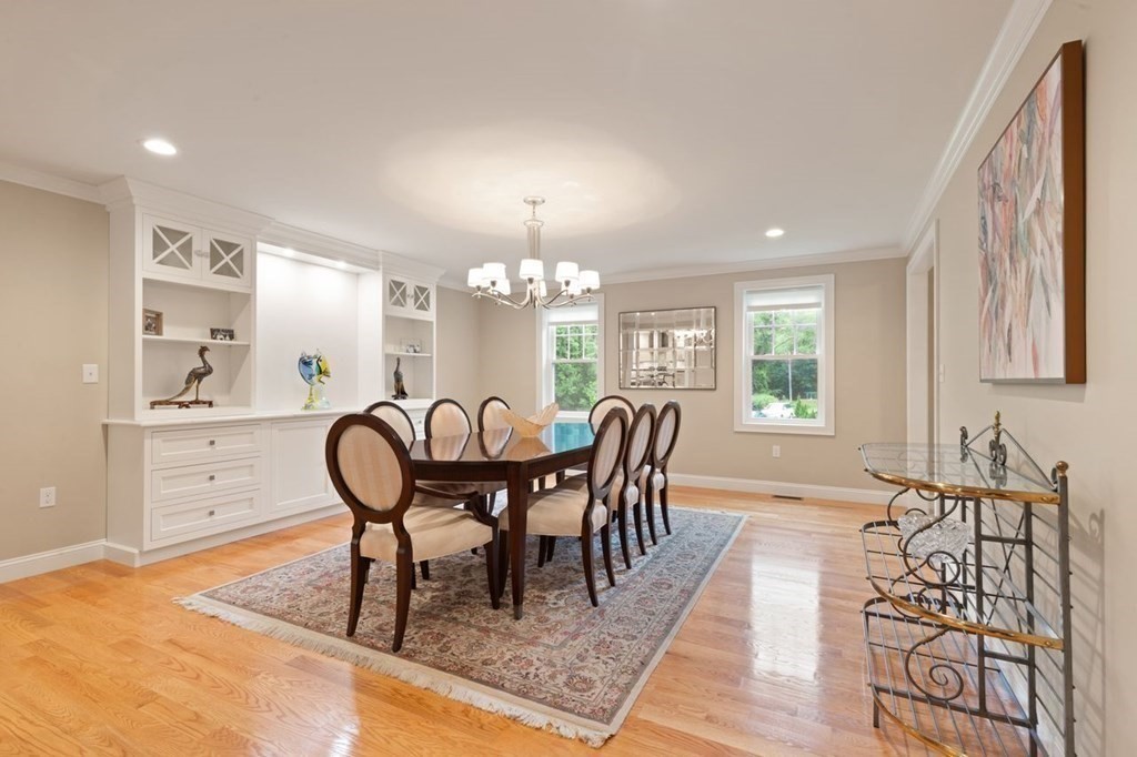 21 Elm Street Canton, MA 02021 - Photo 11 of 39 a view of a dining room with furniture window and wooden floor