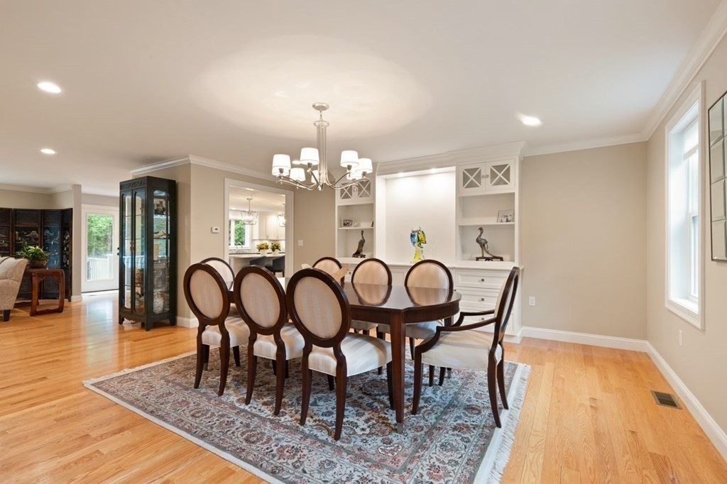 21 Elm Street Canton, MA 02021 - Photo 12 of 39 a view of a dining room with furniture window and wooden floor