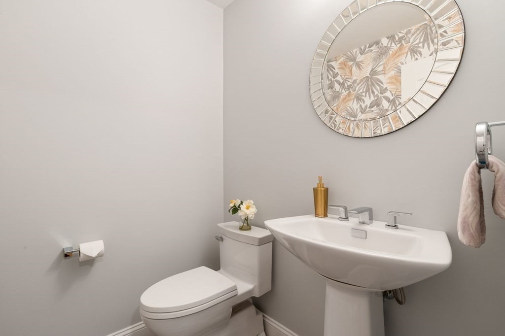 21 Elm Street Canton, MA 02021 - Photo 22 of 39 a bathroom with a toilet and a sink