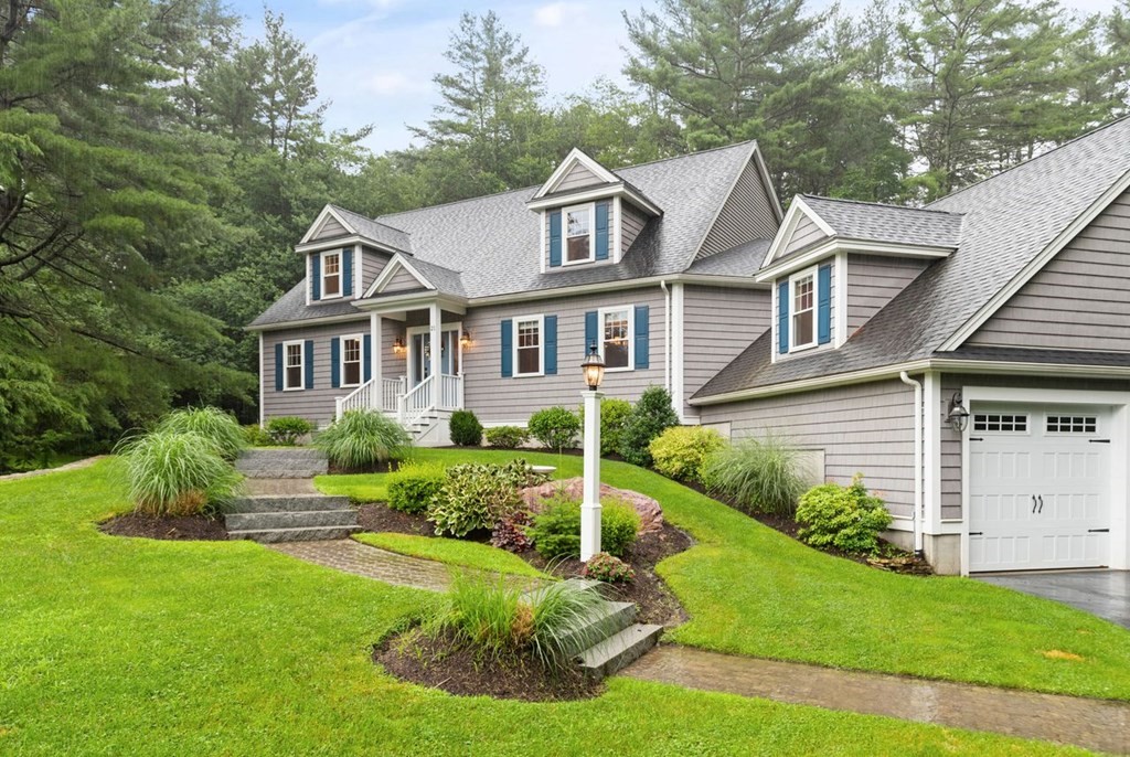 21 Elm Street Canton, MA 02021 - Photo 3 of 39 a front view of a house with a yard