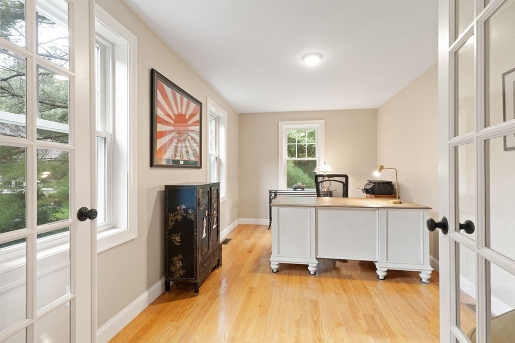 21 Elm Street Canton, MA 02021 - Photo 7 of 39 a view of a workspace with furniture and a window