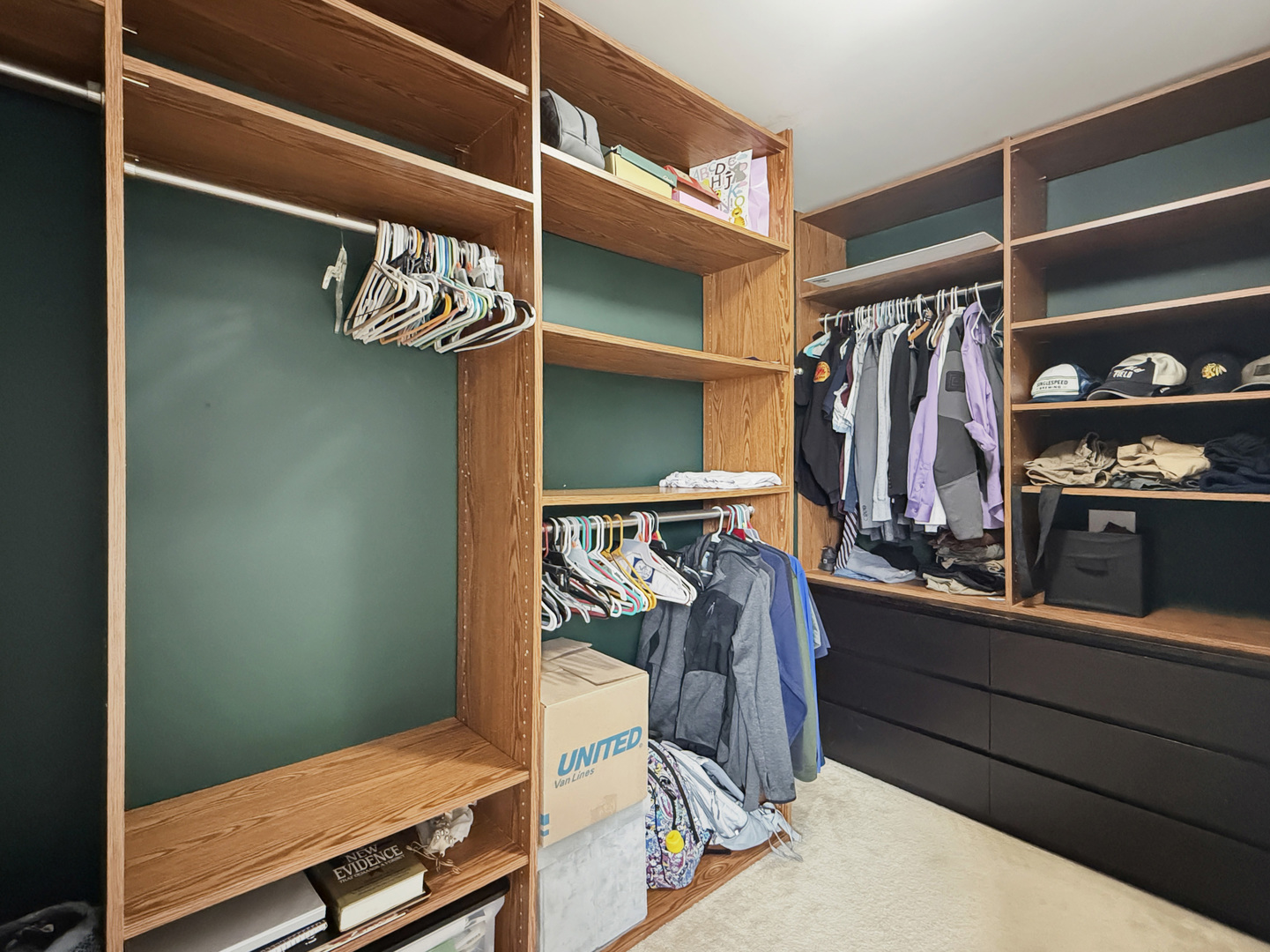 1114 Port Royal Road Pingree Grove, IL 60140 - Photo 13 of 25 a view of walk in closet with clothes and shoes