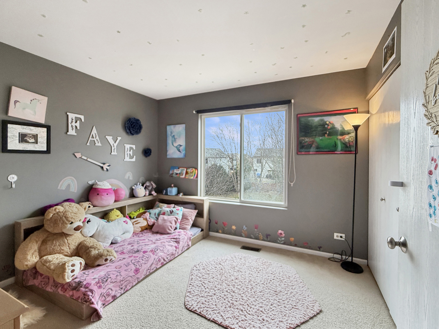 1114 Port Royal Road Pingree Grove, IL 60140 - Photo 14 of 25 a living room with furniture and a window
