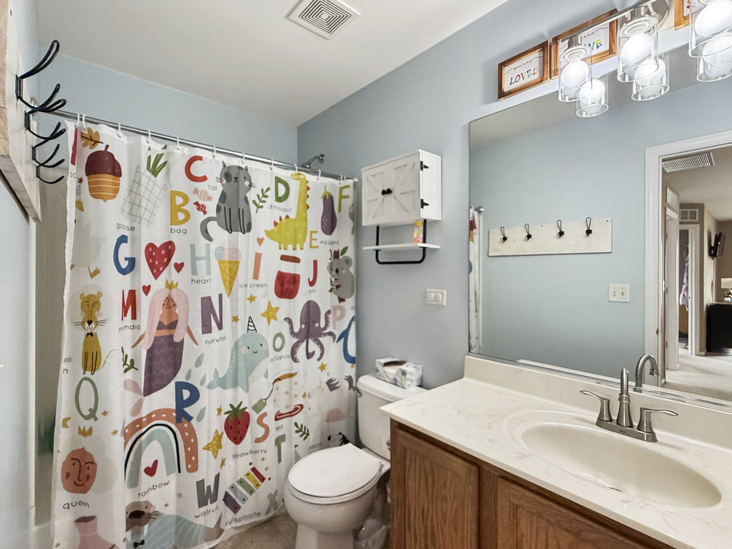 1114 Port Royal Road Pingree Grove, IL 60140 - Photo 18 of 25 a bathroom with a sink and a toilet