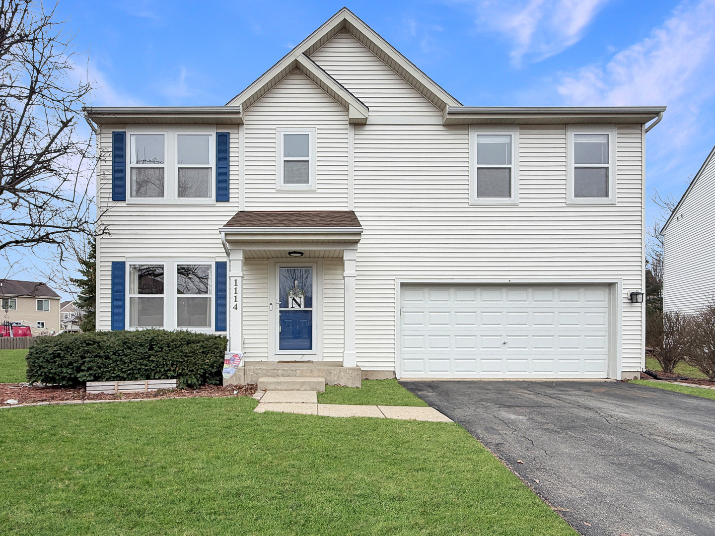 1114 Port Royal Road Pingree Grove, IL 60140 - Photo 2 of 25 a front view of a house with a yard