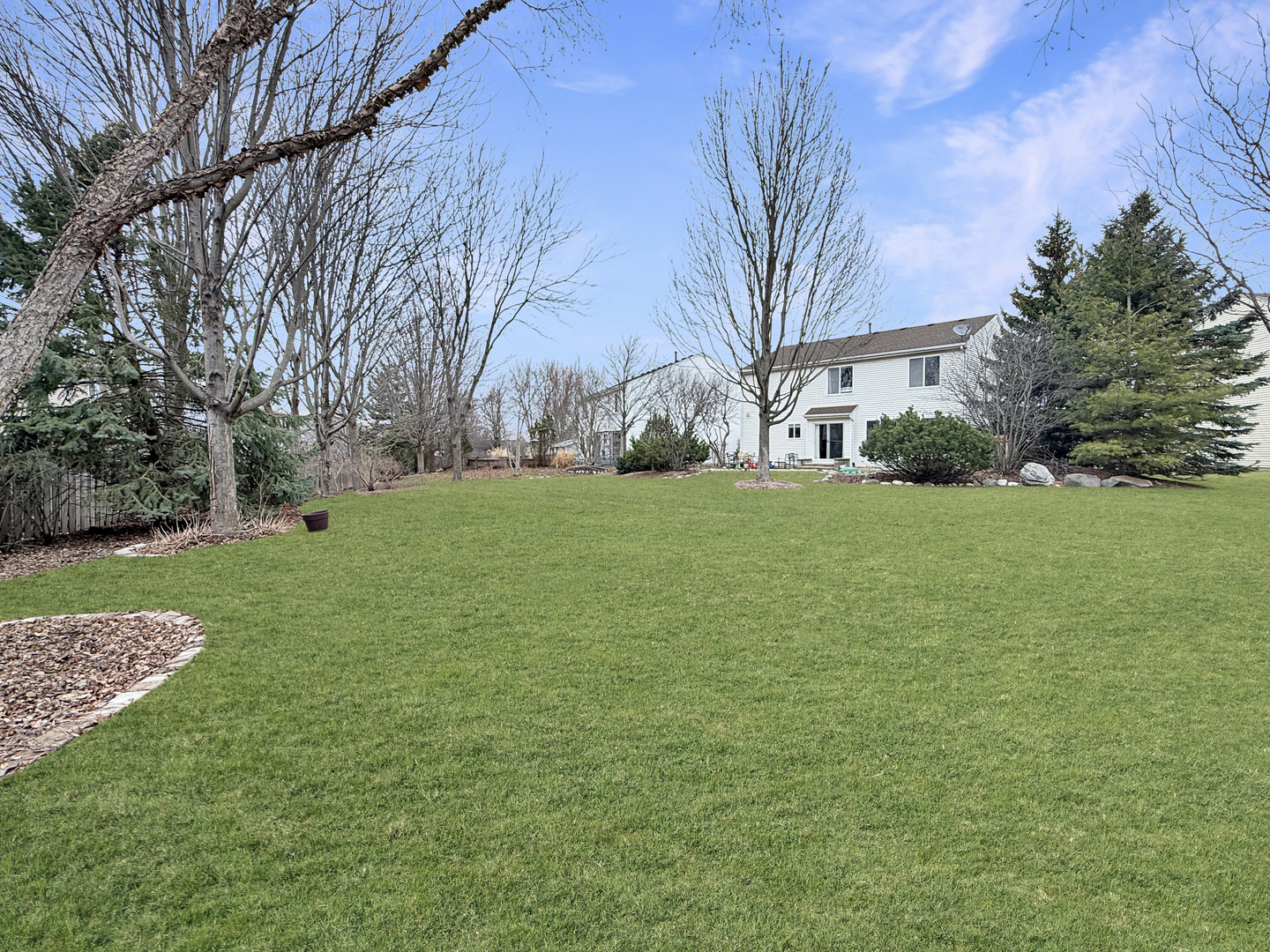 1114 Port Royal Road Pingree Grove, IL 60140 - Photo 23 of 25 a view of a field of grass and trees