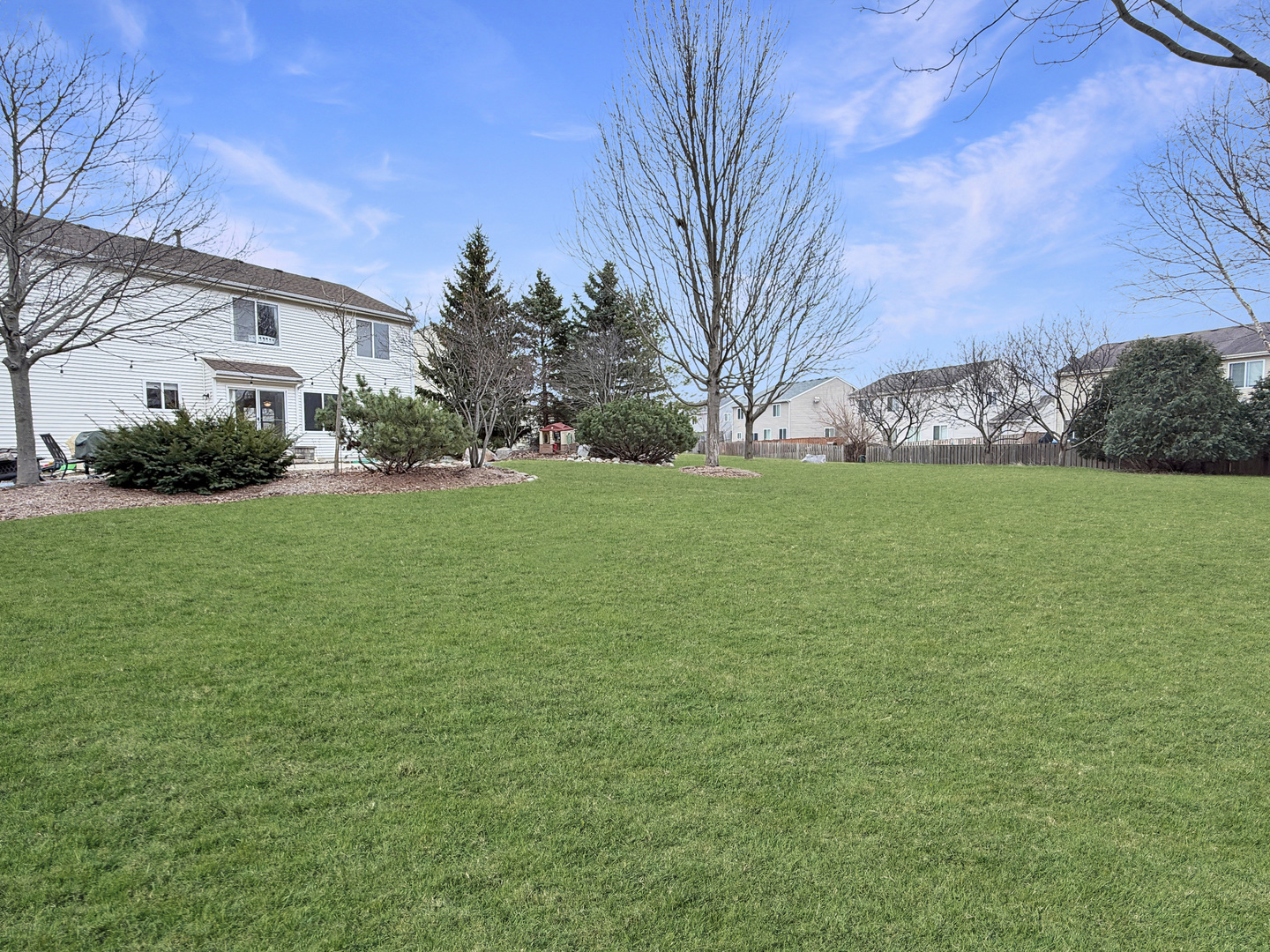 1114 Port Royal Road Pingree Grove, IL 60140 - Photo 24 of 25 a view of a field of grass and trees
