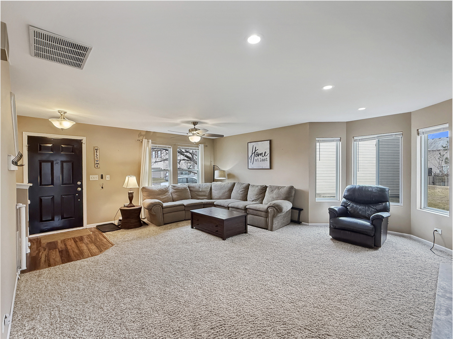 1114 Port Royal Road Pingree Grove, IL 60140 - Photo 4 of 25 a living room with furniture large window and lamp