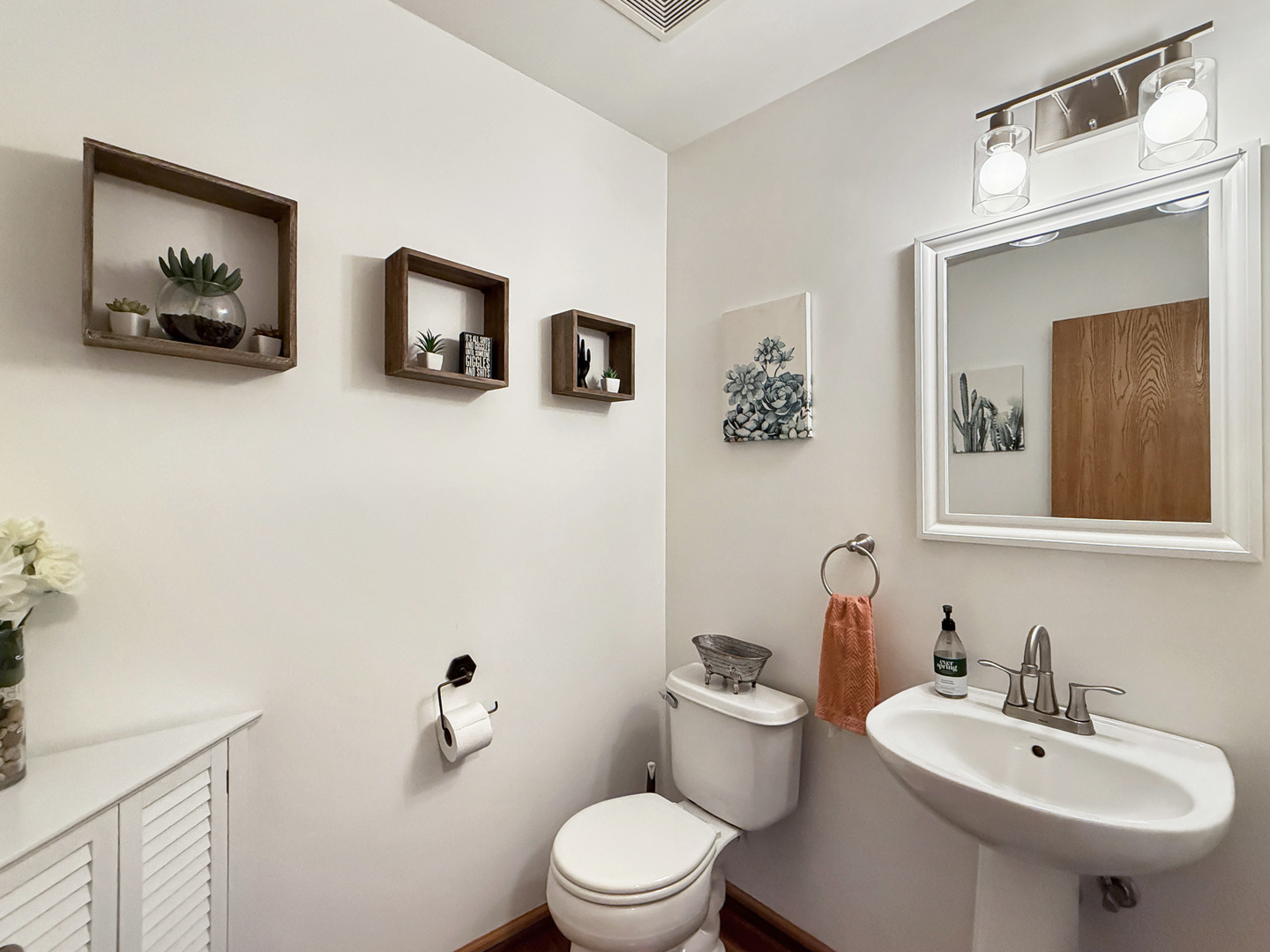 1114 Port Royal Road Pingree Grove, IL 60140 - Photo 10 of 25 a bathroom with a toilet sink and mirror
