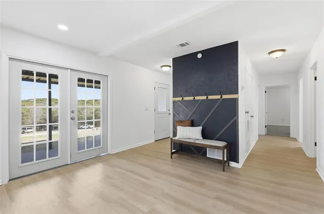 a living room with furniture and a table