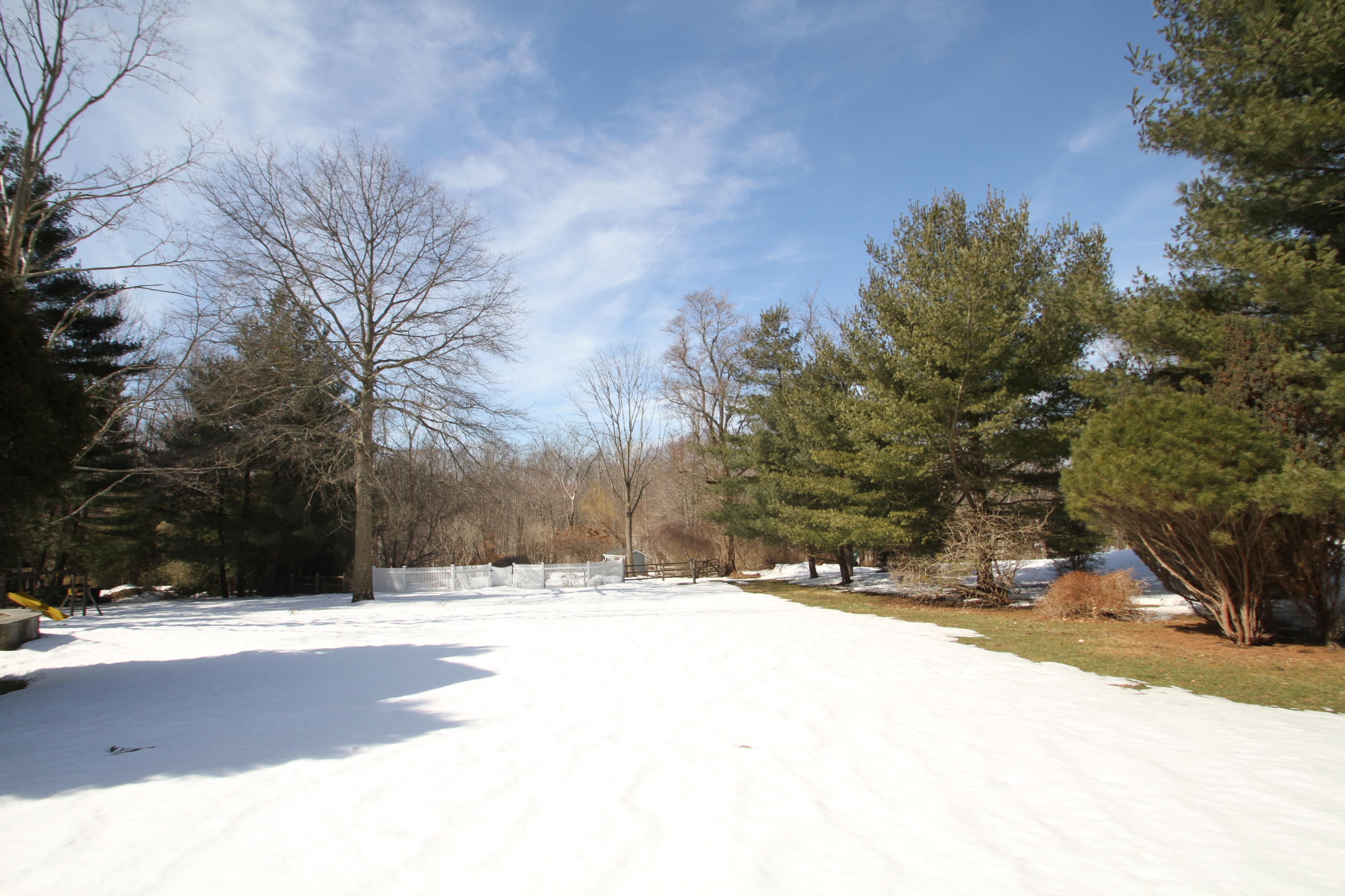 a street view covered with snow