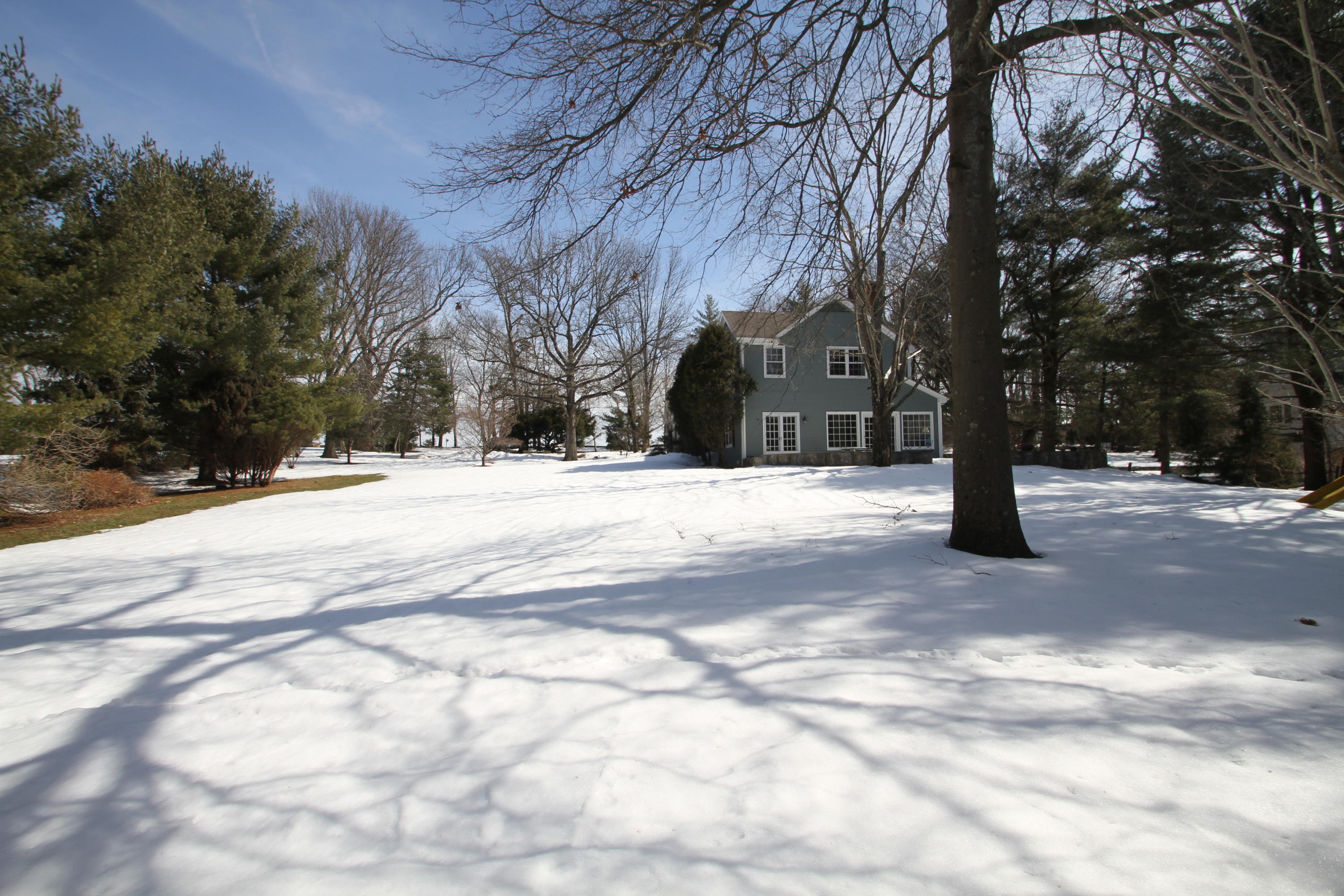 525 Middlesex Road Darien, CT 06820 - Photo 4 of 11 a street view covered with snow