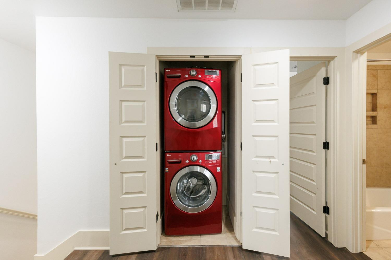 4612 121st Street Lubbock, TX 79424 - Photo 15 of 26 a view of washer and dryer in a utility room