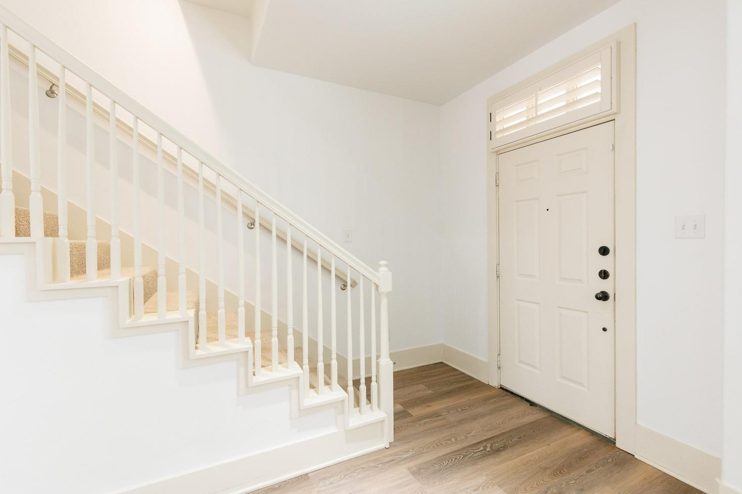 4612 121st Street Lubbock, TX 79424 - Photo 2 of 26 a view of an entryway with wooden floor
