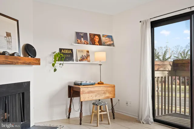 a workspace with furniture and window