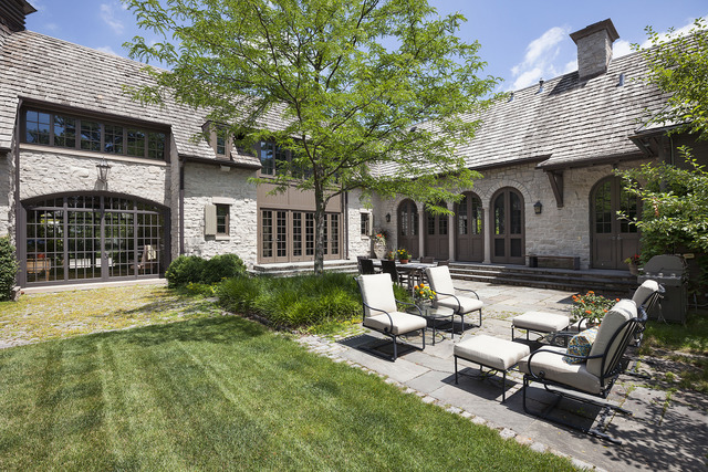 96 Woodley Road Winnetka, IL 60093 - Photo 22 of 22 front view of a house with a patio