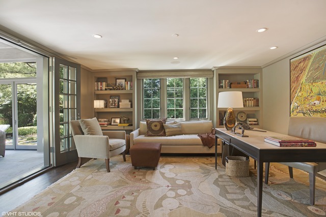 96 Woodley Road Winnetka, IL 60093 - Photo 7 of 22 a living room with furniture and a flat screen tv