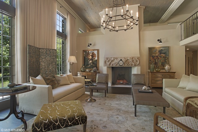 96 Woodley Road Winnetka, IL 60093 - Photo 10 of 22 a living room with furniture a chandelier and a fireplace