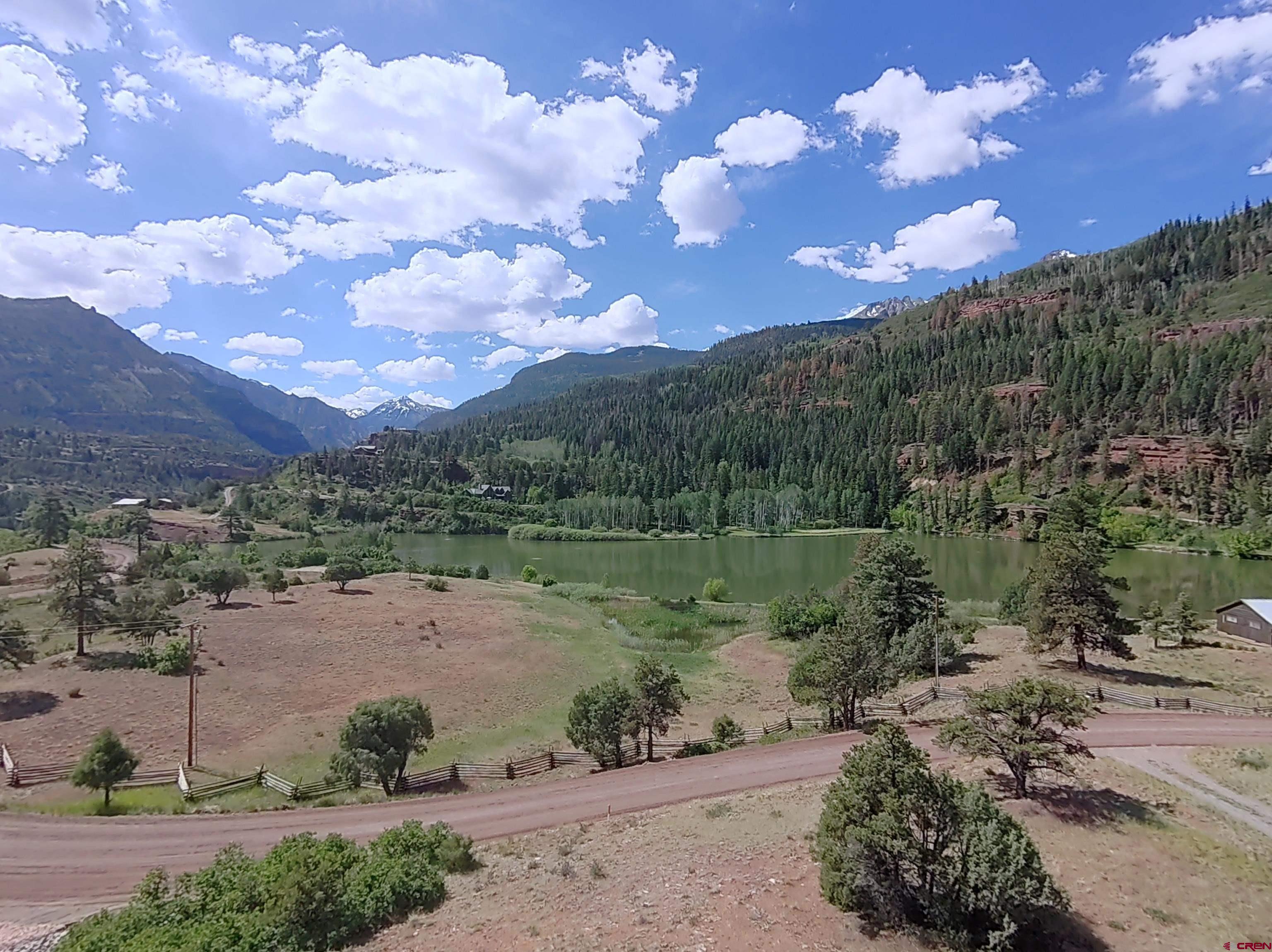2692 County Road 17 Ridgway, CO 81432 - Photo 36 of 38 a view of a lake with mountain in back