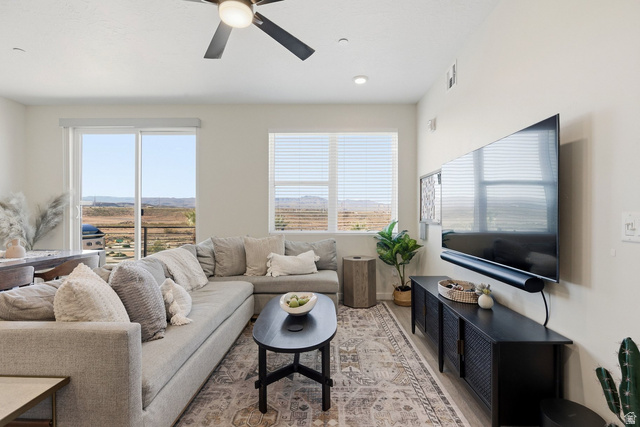 961 West Akoya Pearl Road, Unit 300 St. George, UT 84790 - Photo 1 of 60 Living room featuring a ceiling fan and light wood-style flooring