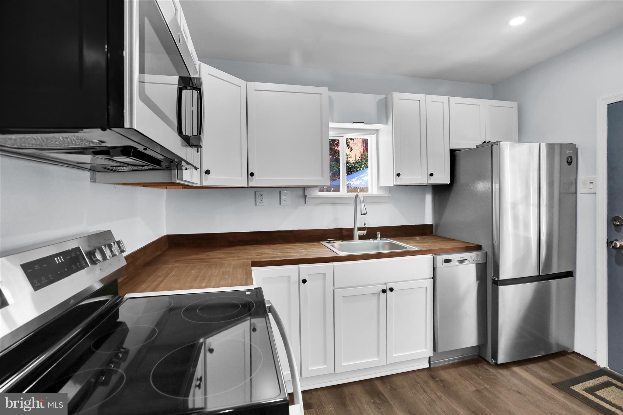 513 Manor Street Lancaster, PA 17603 - Photo 15 of 37 a kitchen with a sink appliances and cabinets