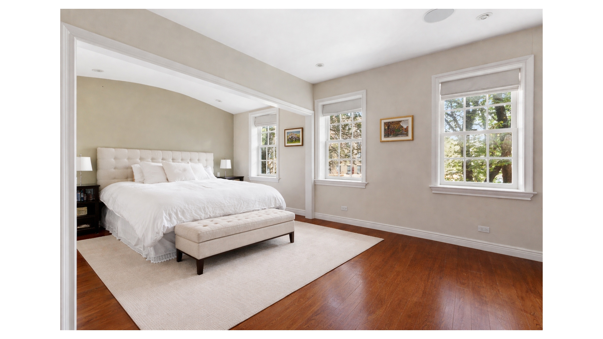 13 Commerce Street Manhattan, NY 10014 - Photo 6 of 13 a bedroom with a large bed and a window