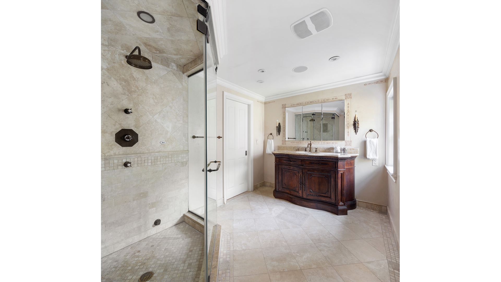13 Commerce Street Manhattan, NY 10014 - Photo 7 of 13 a bathroom with a double vanity sink a mirror and a shower