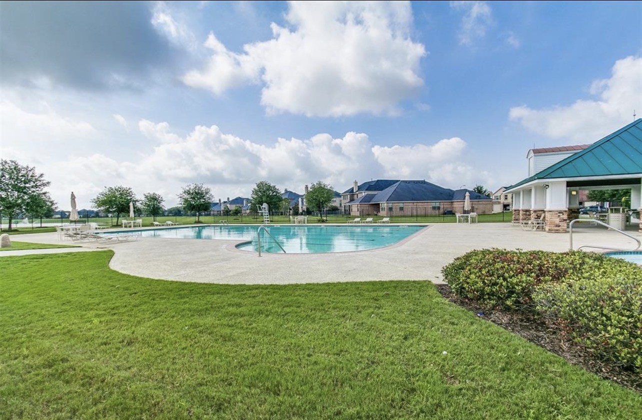 522 Summer Mist Lane Rosenberg, TX 77469 - Photo 32 of 36 Enjoy exclusive access to the neighborhood's refreshing swimming facilities