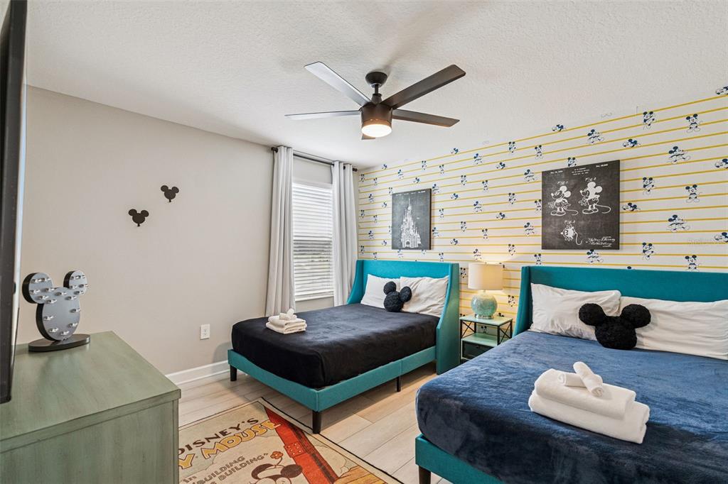 2949 Protagonist Street Kissimmee, FL 34746 - Photo 13 of 93 a living room with furniture and a window