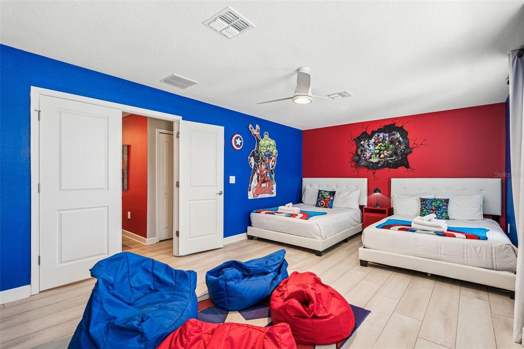 2949 Protagonist Street Kissimmee, FL 34746 - Photo 30 of 93 a bedroom with furniture and a large window