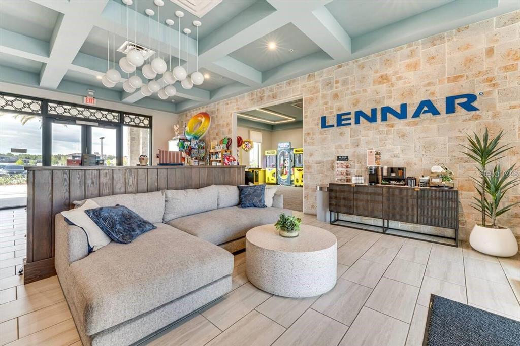 2949 Protagonist Street Kissimmee, FL 34746 - Photo 85 of 93 a living room with furniture and a chandelier