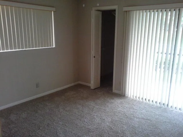 an empty room with windows