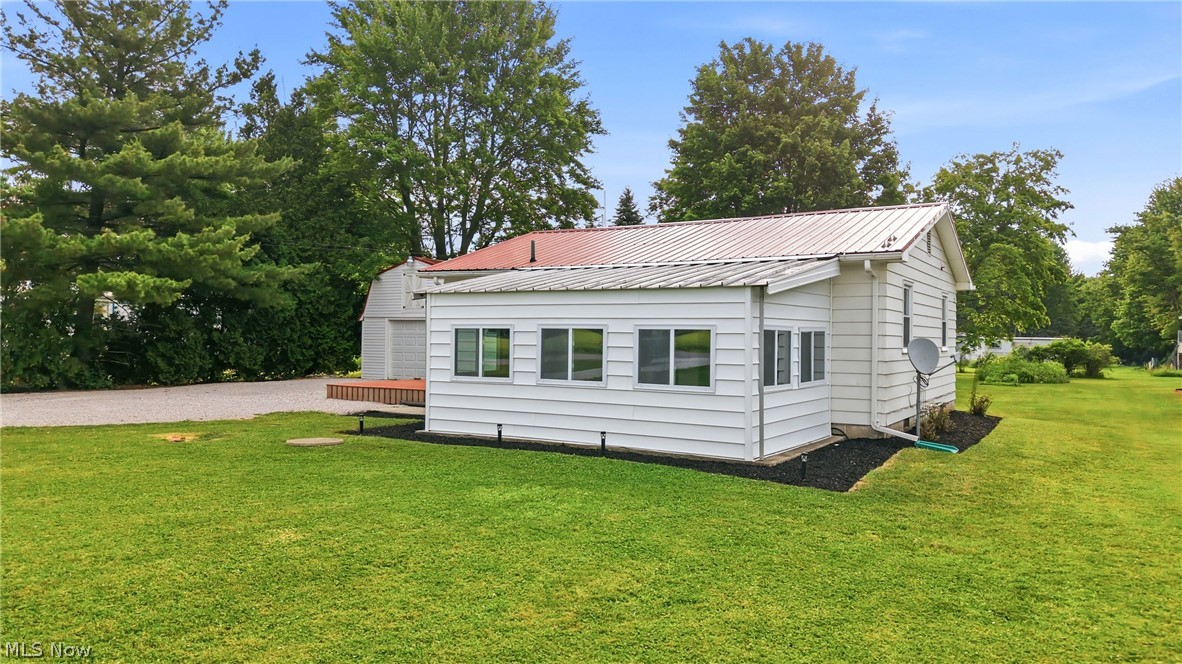 4570 Pymatuning Lake Road Andover, OH 44003 - Photo 4 of 38 Metal roof for ease of maintenance - spacious sun room