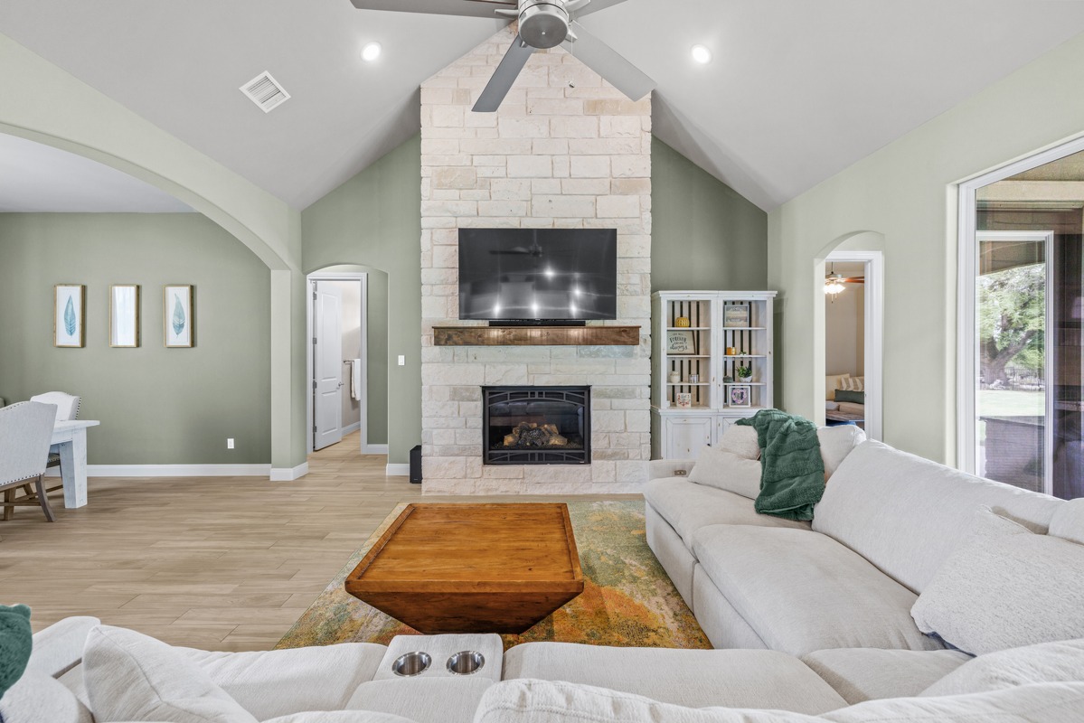 329 Independence Drive Georgetown, TX 78633 - Photo 4 of 34 a living room with furniture and a fireplace