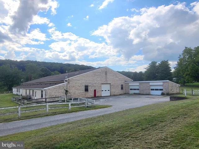 a view of a house with a street