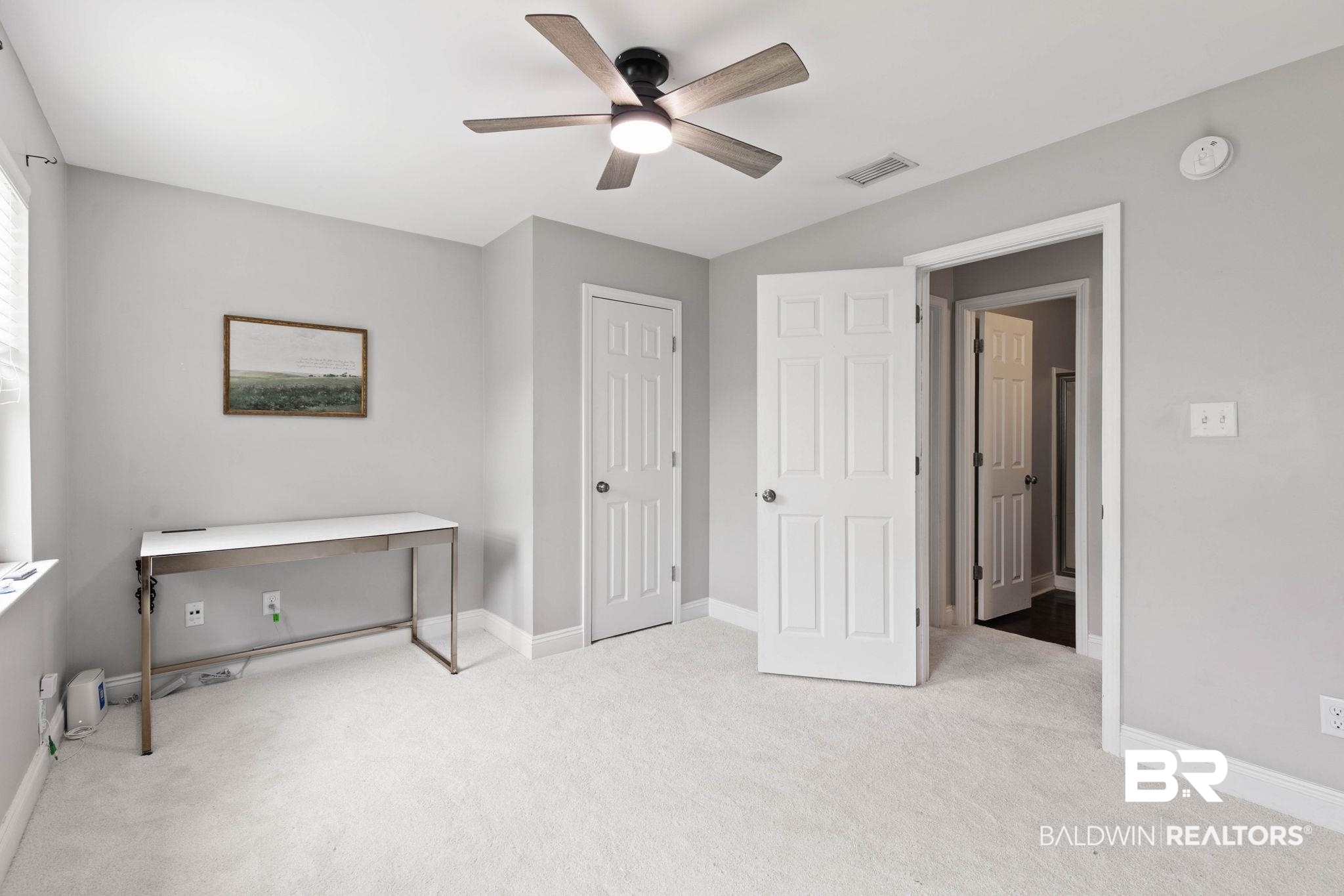 22810 High Ridge Road Fairhope, AL 36532 - Photo 44 of 78 Carpeted room featuring a ceiling fan with integrated lighting, a window with blinds, and light gray wall paint