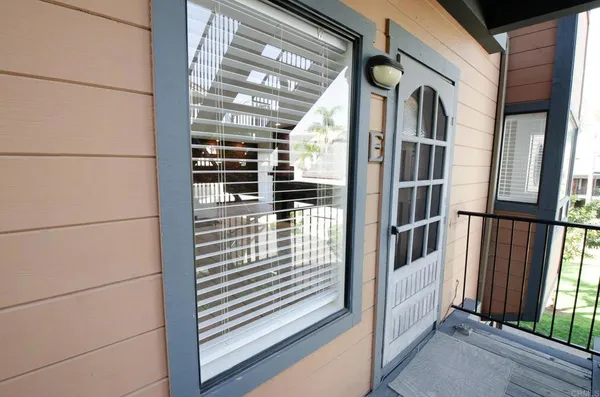 a view of entry way with wooden door