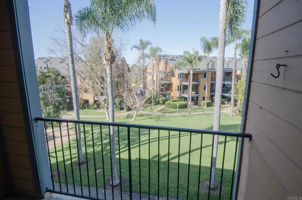 a view of a balcony with lake view