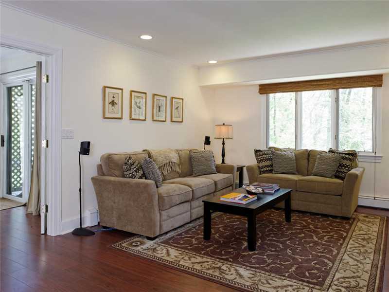 102 Long Close Road Stamford, CT 06902 - Photo 16 of 25 a living room with furniture and a large window