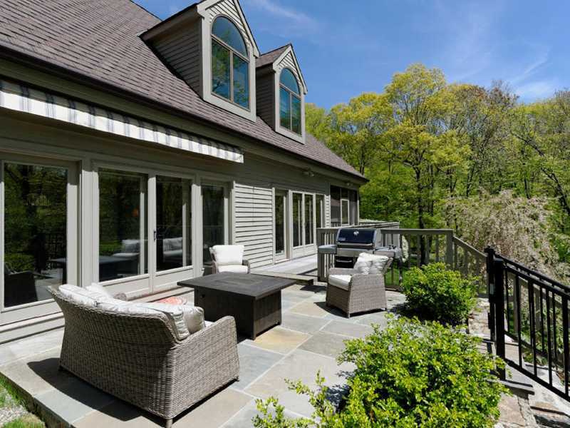 102 Long Close Road Stamford, CT 06902 - Photo 24 of 25 a view of a house with pool and chairs
