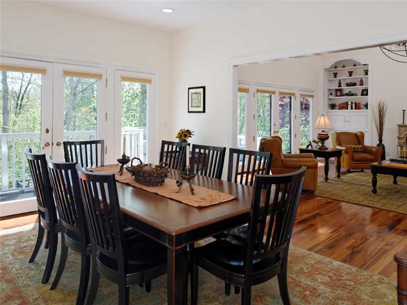 102 Long Close Road Stamford, CT 06902 - Photo 4 of 25 a view of a dining room with furniture window and outside view
