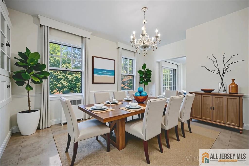 205 Ashland Road Middlesex, NJ 08846 - Photo 11 of 50 a view of a dining room with furniture window and wooden floor